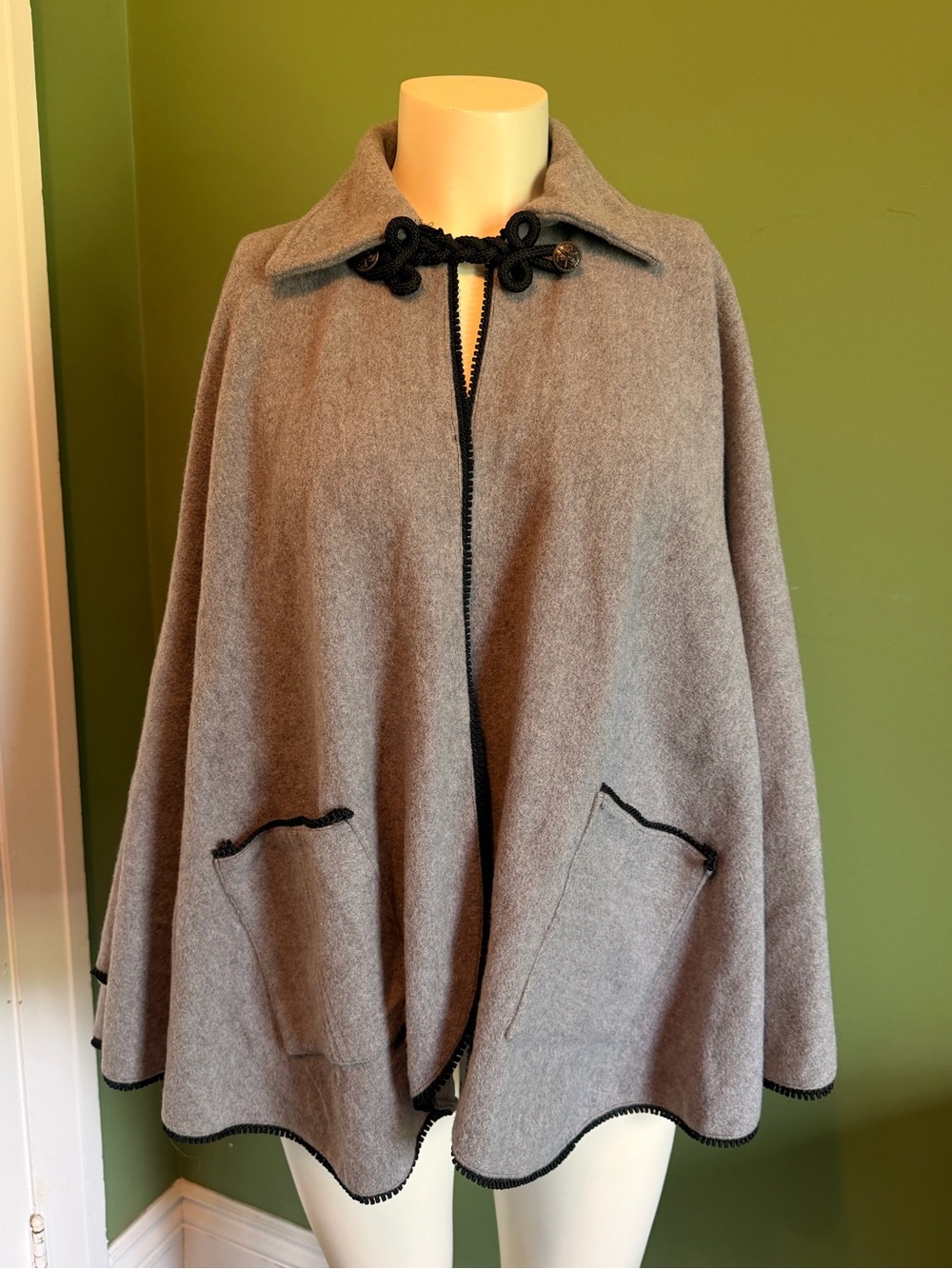 Classic Gray Cape-Style Sweater with Black Trim